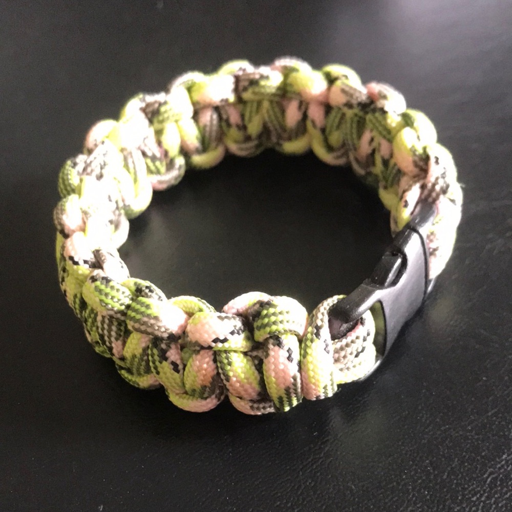 Green and light pink paracord bracelet
